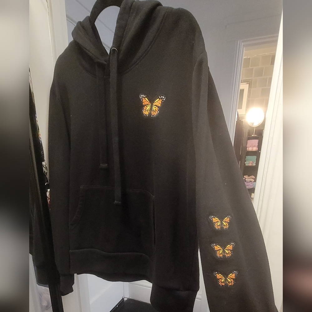 Reflex Black Hoodie with Butterfly Accents